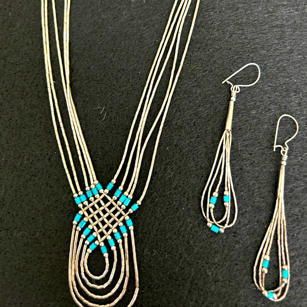 Navajo Liquid silver and turquoise necklace and earrings.